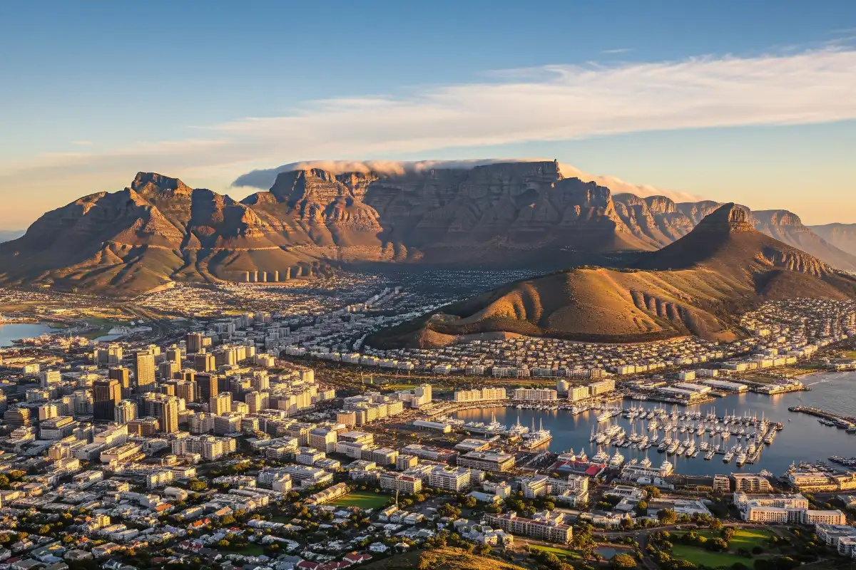 A photo of Table Mountain and a view of Cape Town city.