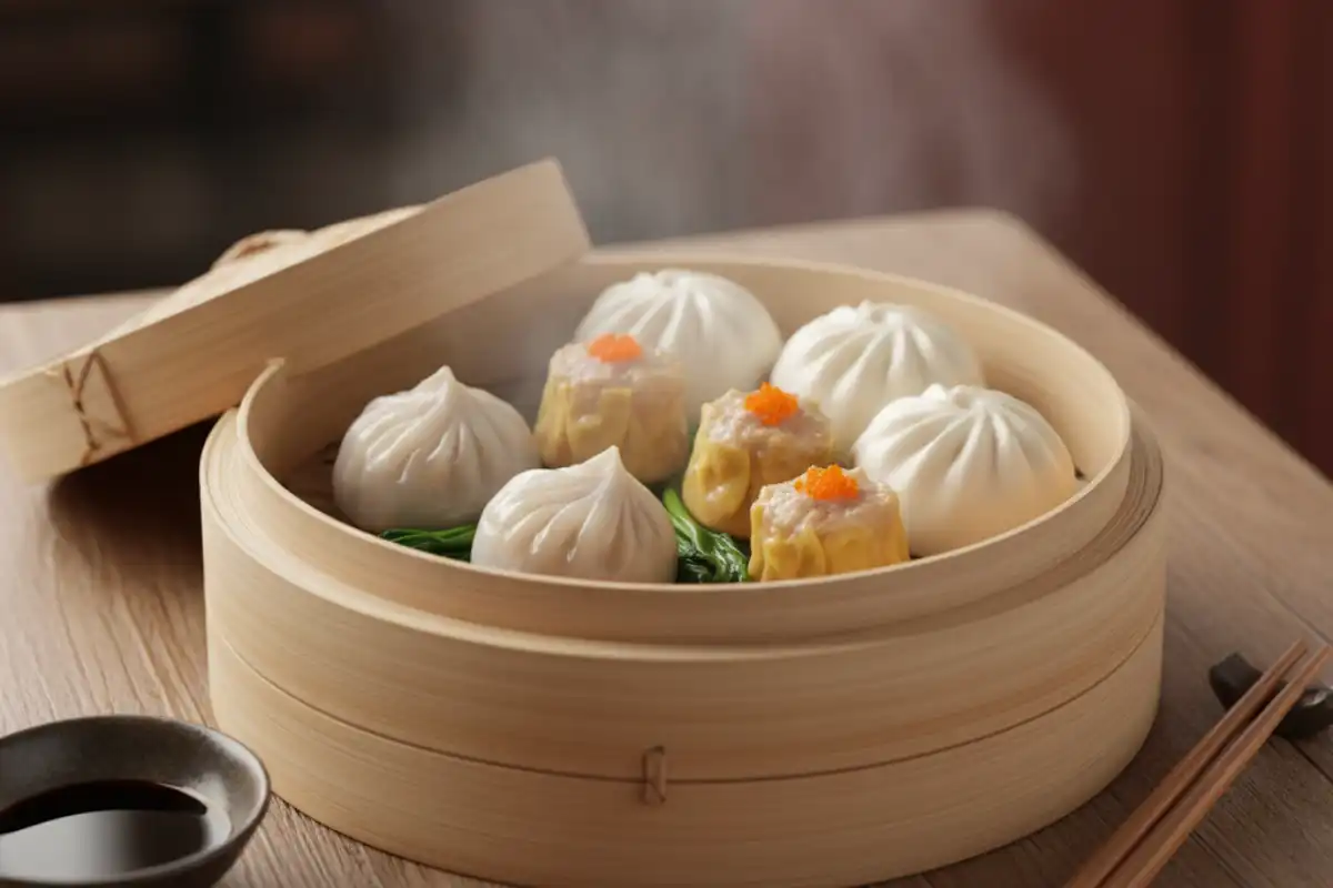 A bamboo basket filled with traditional Cantonese Dim Sum dumplings.