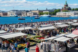 A photo of Helsinki's Market Square with the Baltic Sea and boats in the background