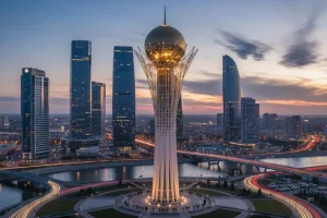 View of the Bayterek Tower in Astana against a modern skyline.