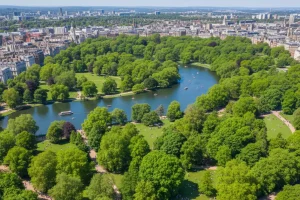 Aerial view of Hyde Park in spring with green trees and the Serpentine lake