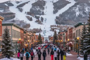 Aspen town center with the steep slopes of Aspen Mountain (Ajax) visible directly behind the town.